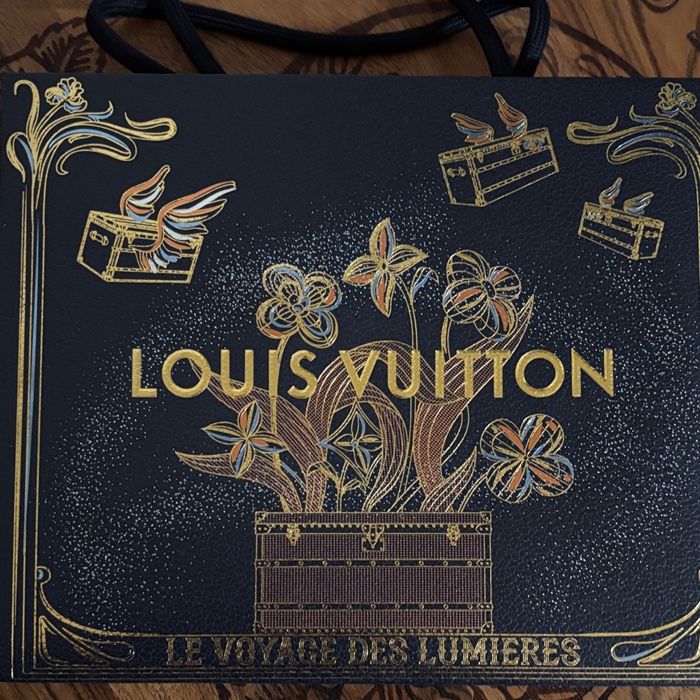 Louis Vuitton Black and Gold Floral Design